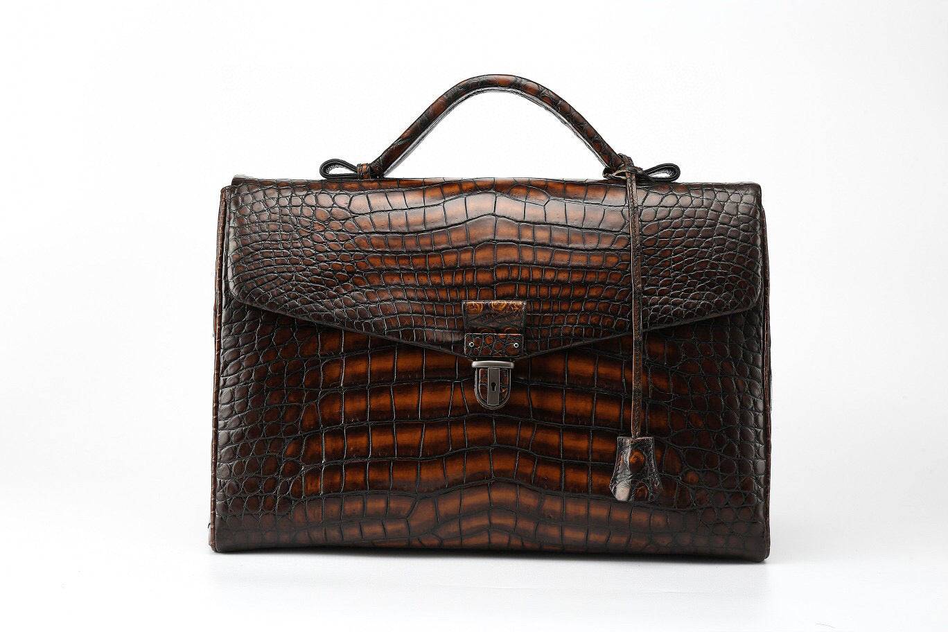 Genuine crocodile leather briefcase by Rossie Viren, vintage brown business handbag with textured crocodile pattern.