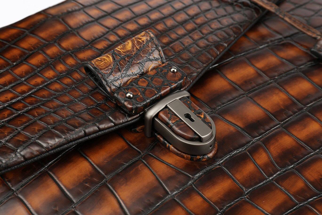 Vintage brown genuine crocodile leather briefcase handbag by Rossie Viren, featuring a sleek, textured business bag design.