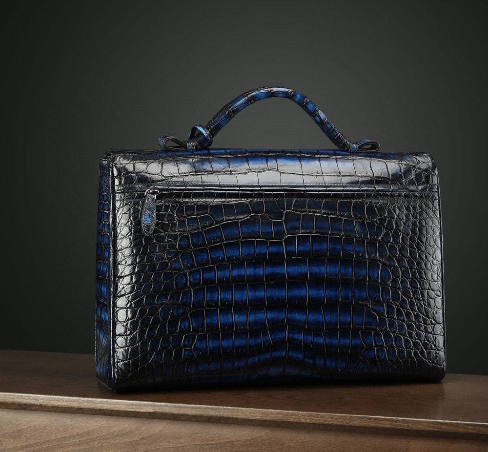 Genuine crocodile leather briefcase by Rossie Viren, vintage brown business bag with sleek, textured crocodile skin design.