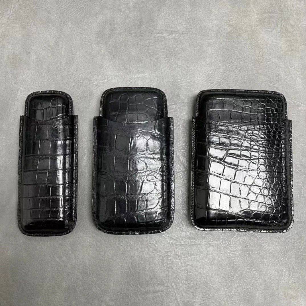 Genuine crocodile leather card holder by Rossie Viren featuring a sleek, textured design perfect for holding business or credit cards.