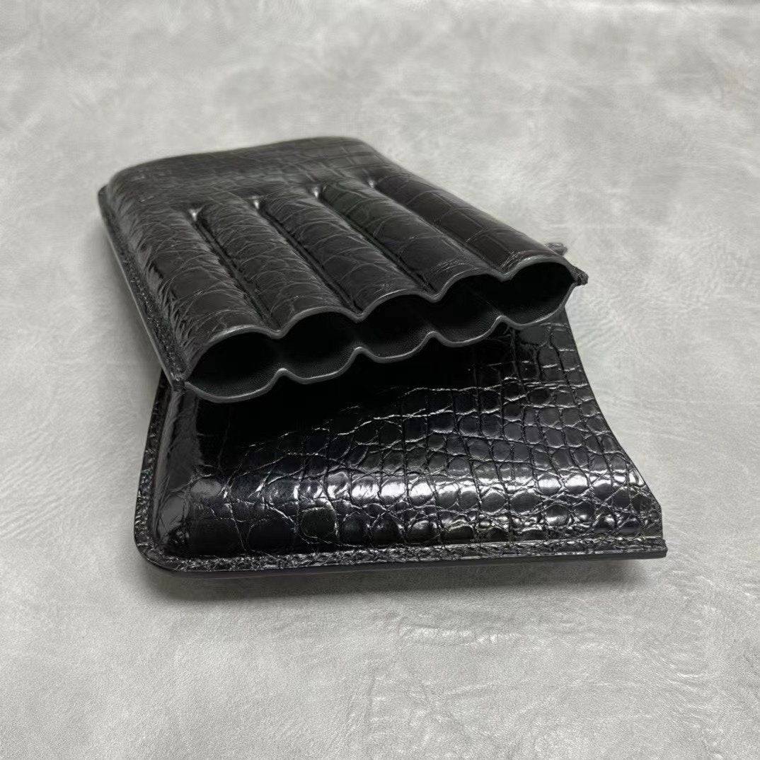 Genuine crocodile leather cigar case and card holder by Rossie Viren, showcasing textured crocodile skin and sleek design.