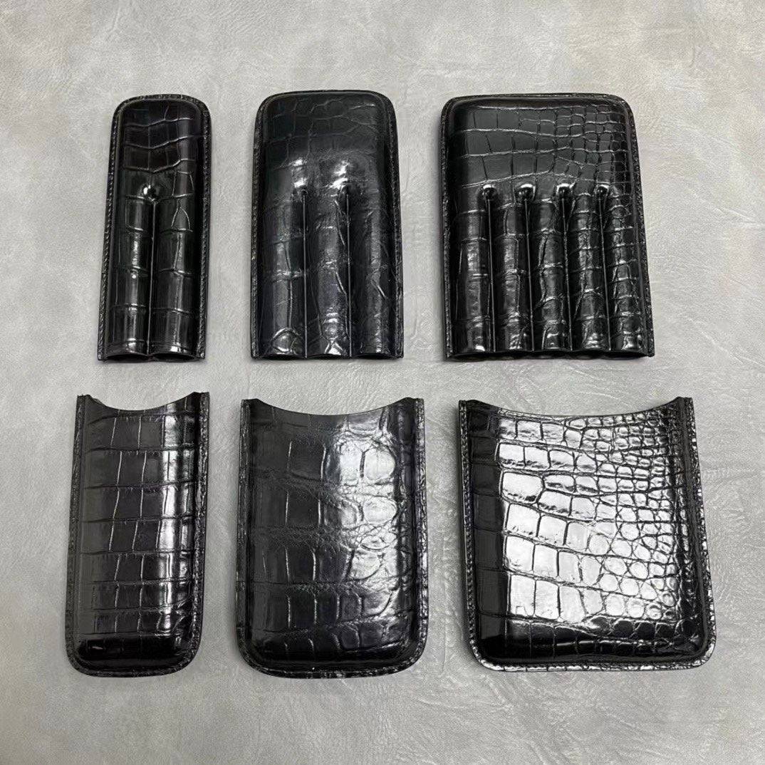 Genuine crocodile leather cigar case and card holder by Rossie Viren, featuring a textured, luxurious finish for stylish storage.