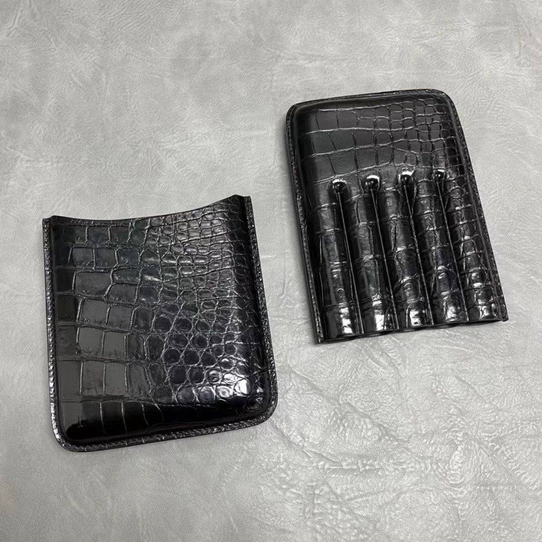 Genuine crocodile leather cigar case by Rossie Viren, featuring a sleek, textured finish and secure card holder design.