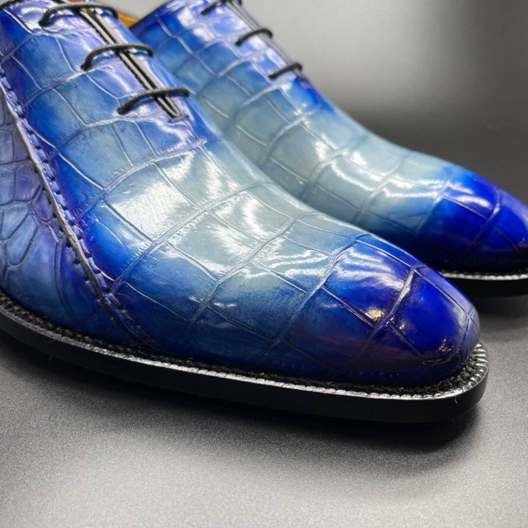 Rossie Viren genuine crocodile leather men's penny loafers in hand-painted two-tone blue, stylish dress shoes with a polished finish.