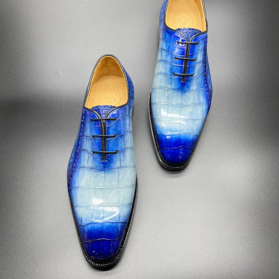 Rossie Viren genuine crocodile leather men's penny loafers in hand-painted two-tone blue, dress shoes with a sleek, polished appearance.