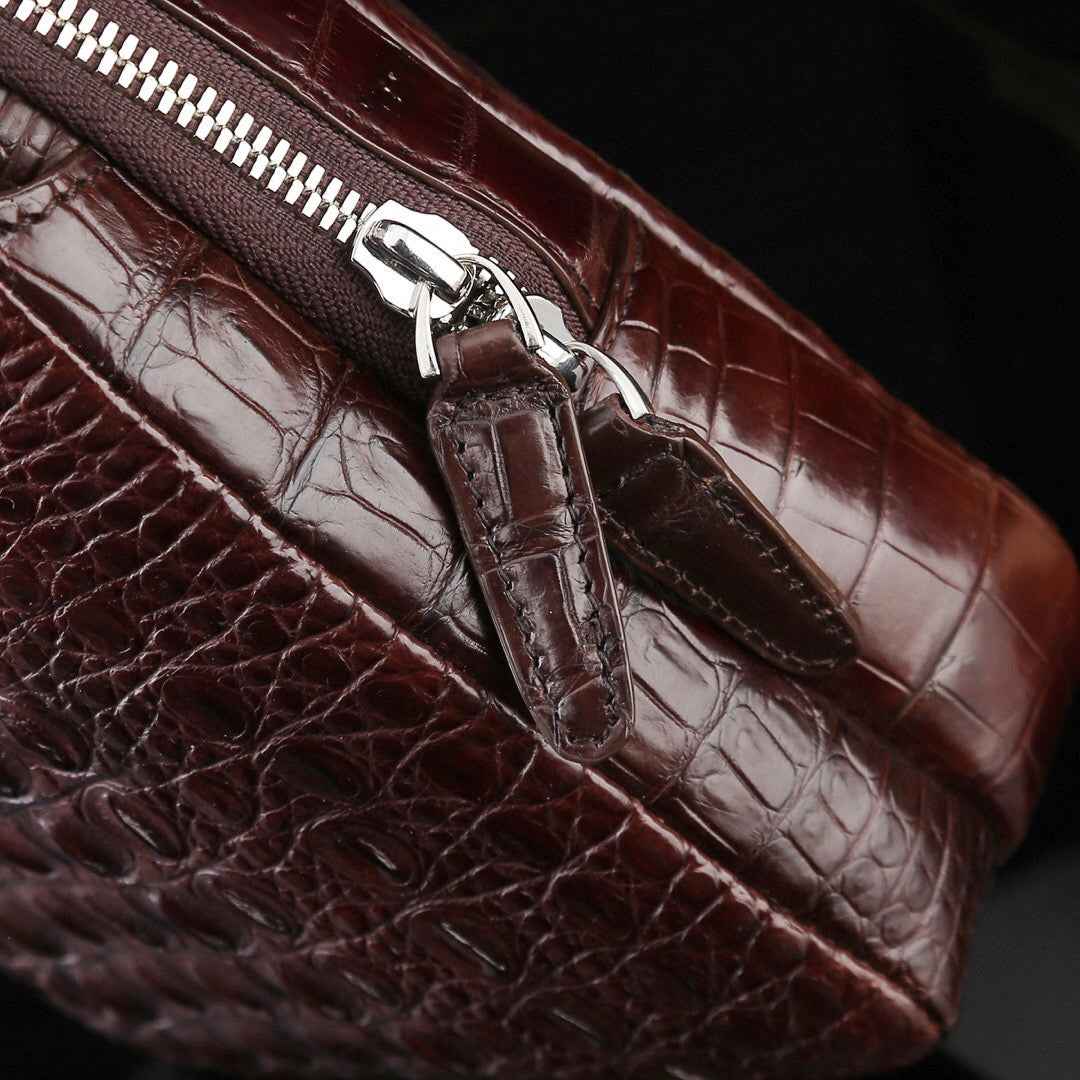 Genuine crocodile leather men's sling chest bag with adjustable strap and sleek design by Rossie Viren.