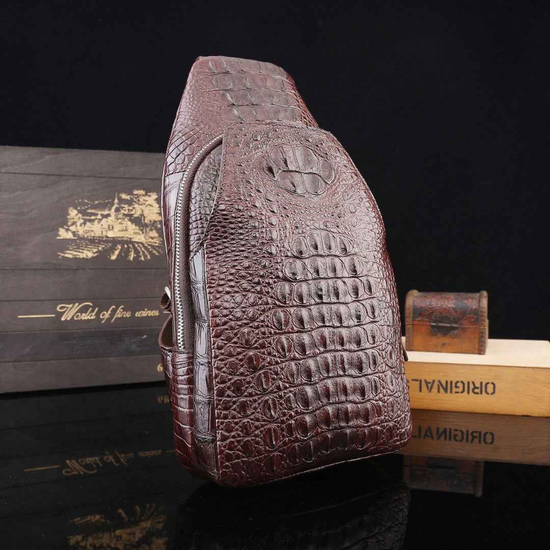Genuine crocodile leather men's sling chest bag with adjustable strap and sleek design by Rossie Viren.