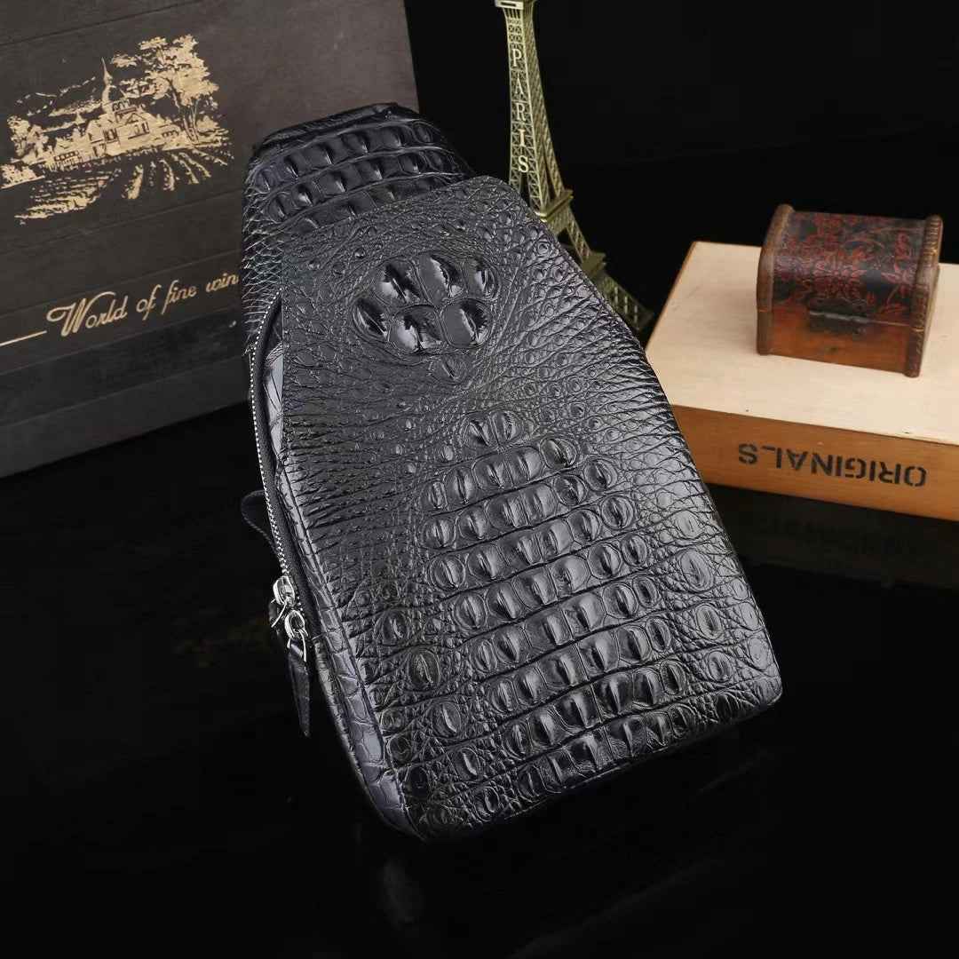 Genuine crocodile leather men's sling chest bag by Rossie Viren, featuring a sleek, textured crocodile pattern and adjustable strap.