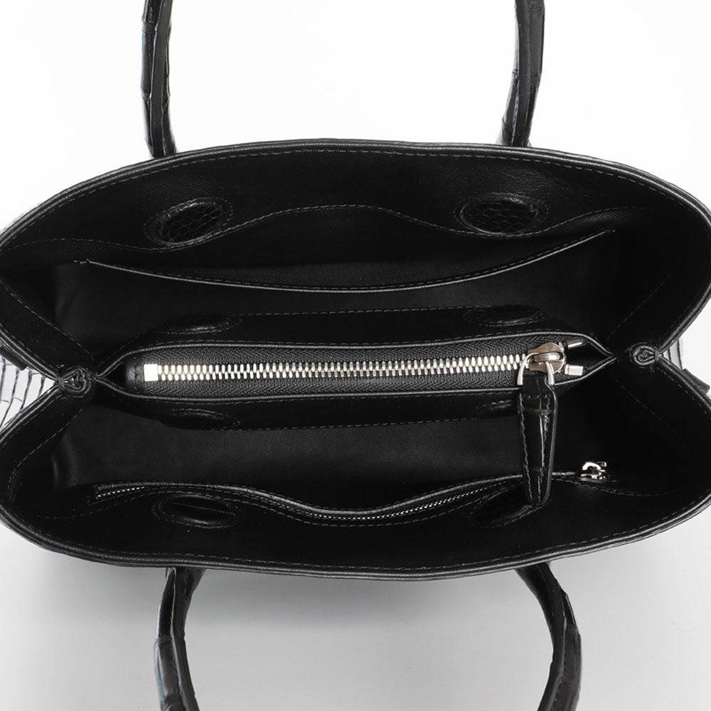 Black genuine crocodile leather top handle handbag by Rossie Viren, featuring a structured design with shoulder strap and tote style.