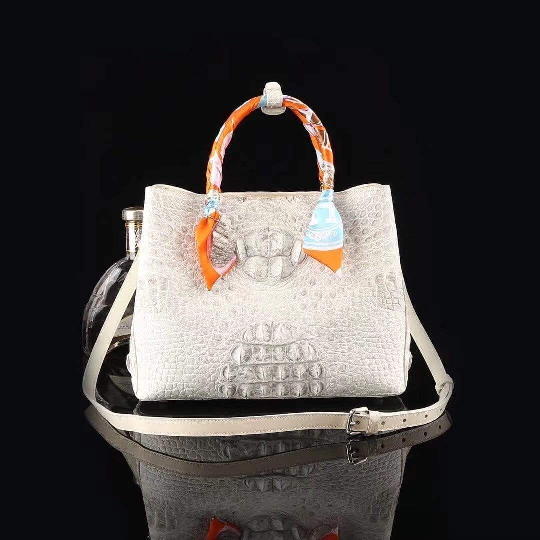 Genuine crocodile leather medium double satchel handbag by Rossie Viren with top handles and secure buckle closure.