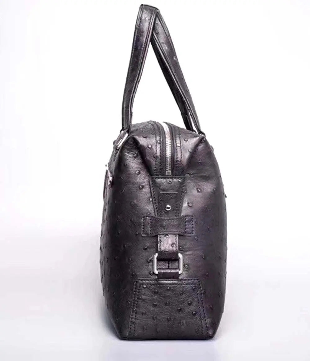 Black genuine ostrich leather briefcase tote bag by Rossie Viren, featuring textured surface and sturdy handles for professional use.