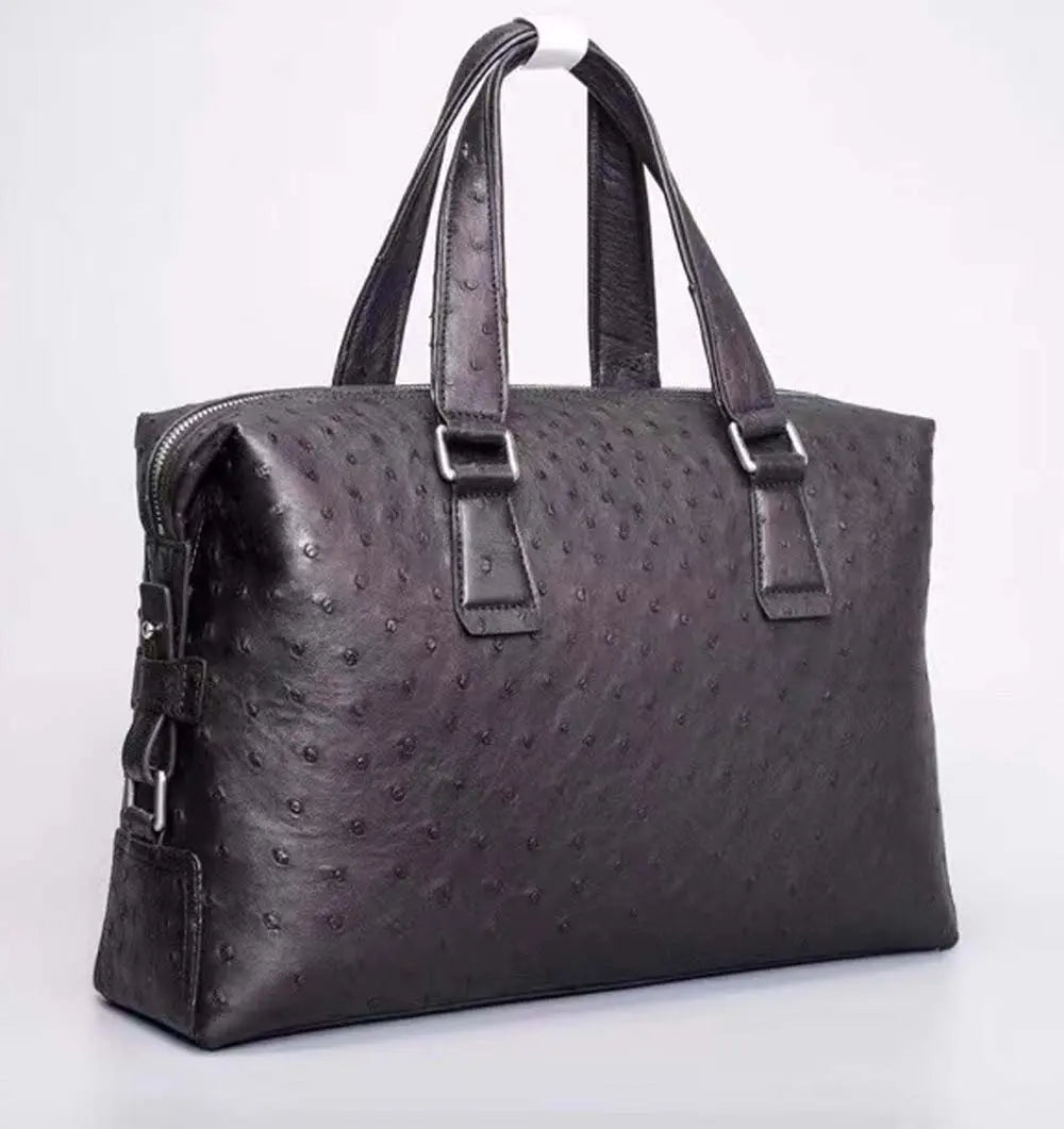 Black genuine ostrich leather briefcase tote bag by Rossie Viren, showcasing a sleek and textured design for professional use.