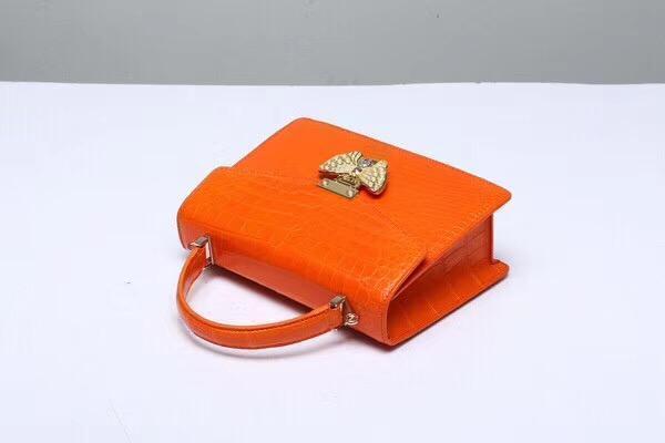 Genuine Siamese crocodile leather orange top handle crossbody bag by Rossie Viren with shoulder strap and elegant design.