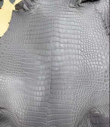 Gray crocodile leather golf head cover handbag by Rossie Viren featuring a textured crocodile pattern and elegant design.