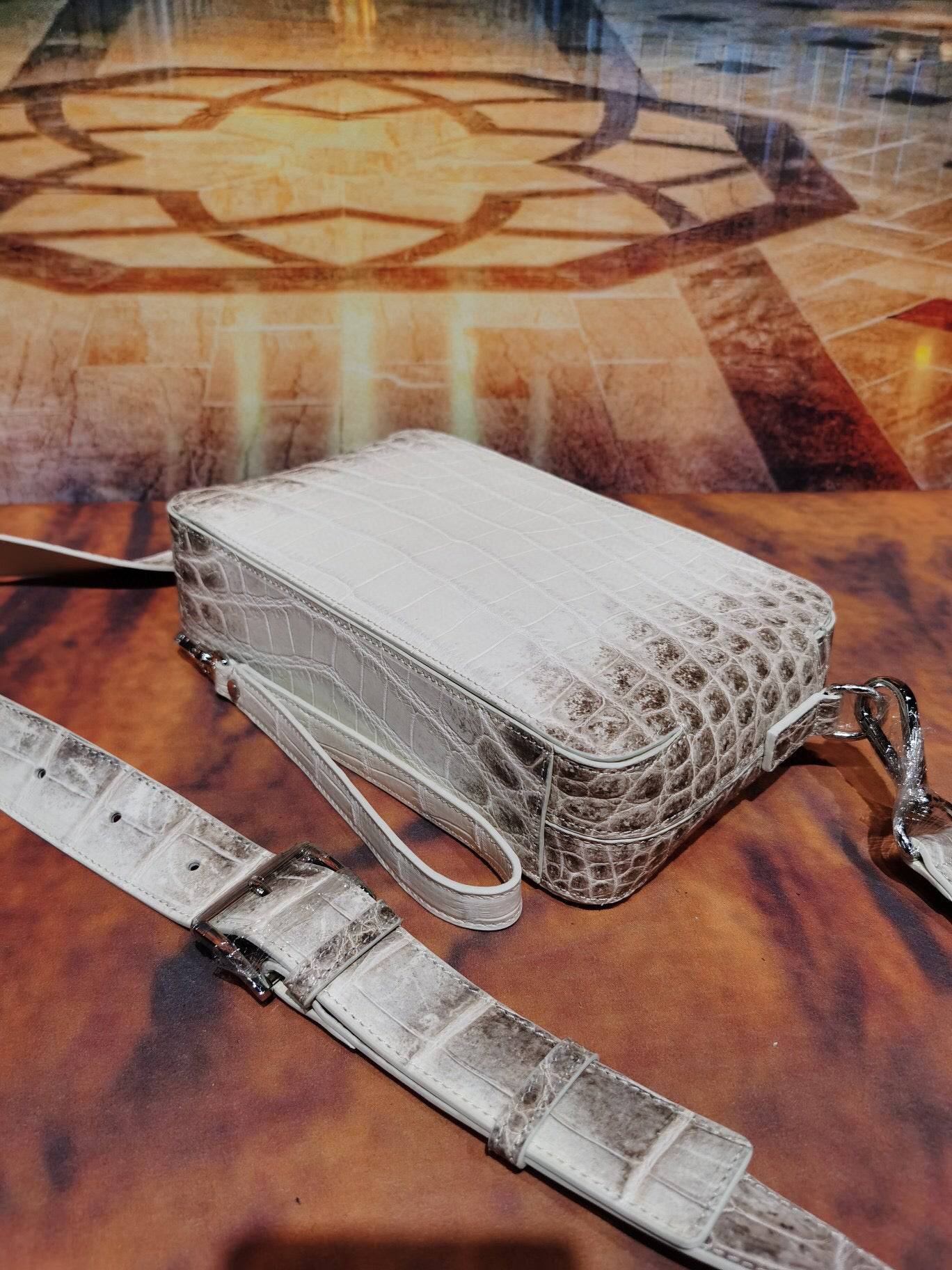 Rossie Viren Himalaya White genuine crocodile skin leather backpack with shoulder, chest, and crossbody styles.