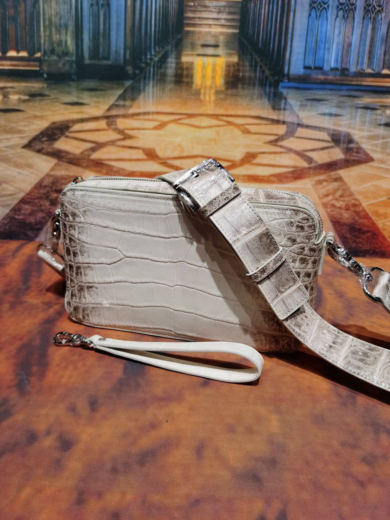 Rossie Viren Himalaya White crocodile skin leather backpack with shoulder strap and chest crossbody design.