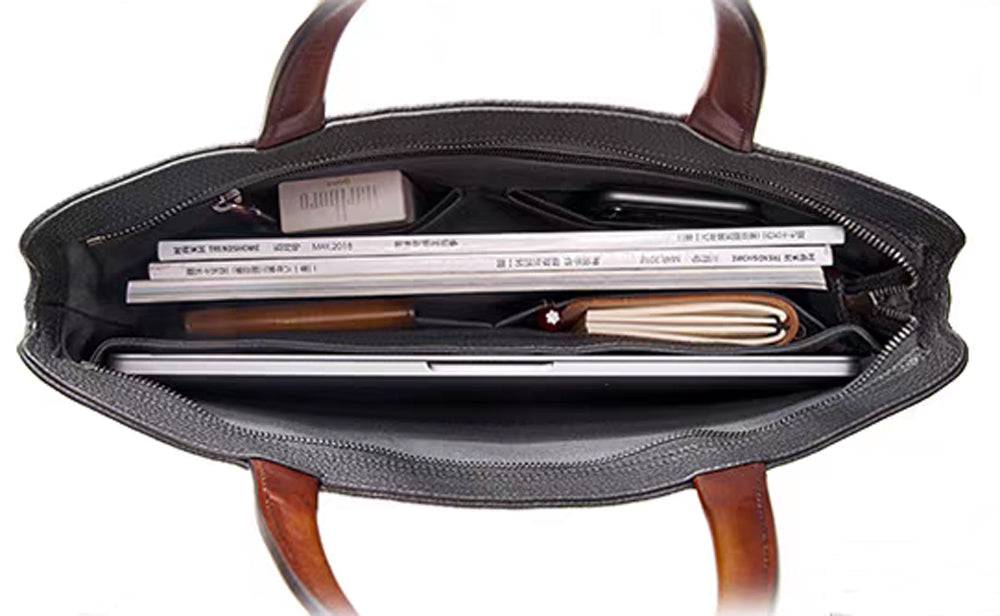 Inside view of Rossie Viren 14-inch black grainy leather laptop briefcase handbag with compartments and lining.