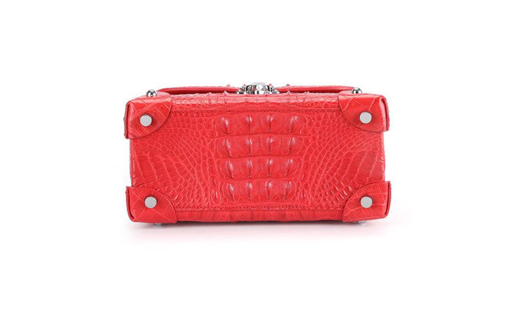 Rossie Viren ladies top-handle handbag in genuine crocodile leather with a cross-body messenger design and elegant handle details.