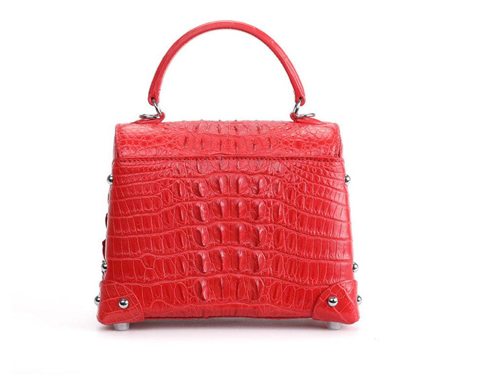 Rossie Viren genuine crocodile leather ladies top-handle handbag with crossbody strap and messenger style design.