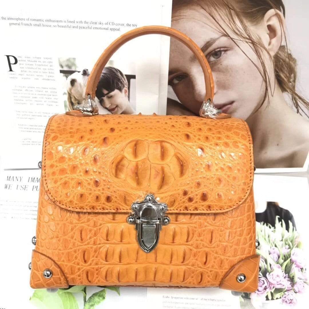Rossie Viren ladies top-handle handbag in genuine crocodile leather with a crossbody messenger style and elegant design