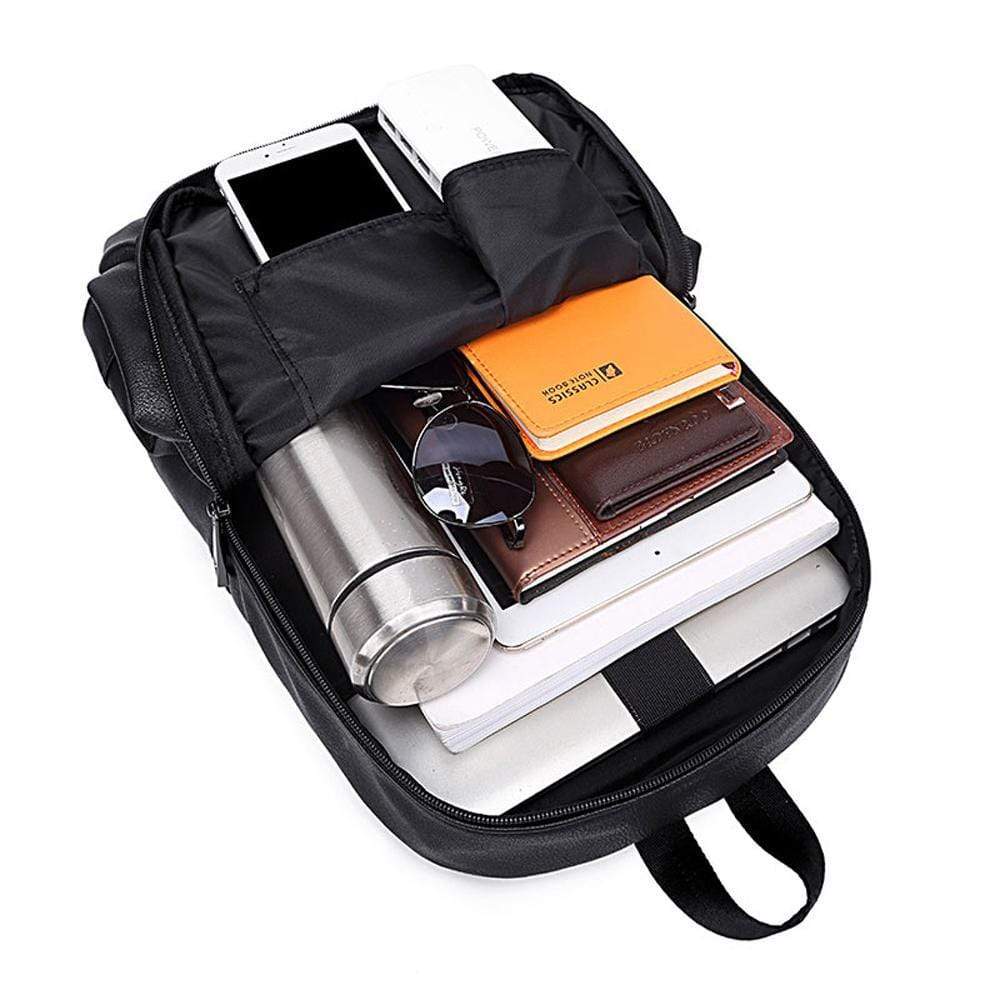 Rossie Viren large waterproof backpack with pleated front zip pocket, perfect for luggage and laptop storage.