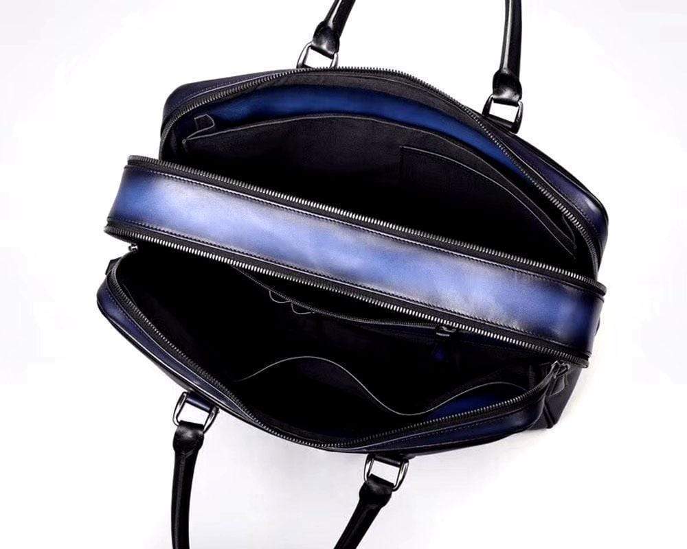 Vintage Rossie Viren cowhide leather briefcase and laptop bag with smooth finish, featuring sturdy handles and classic design.