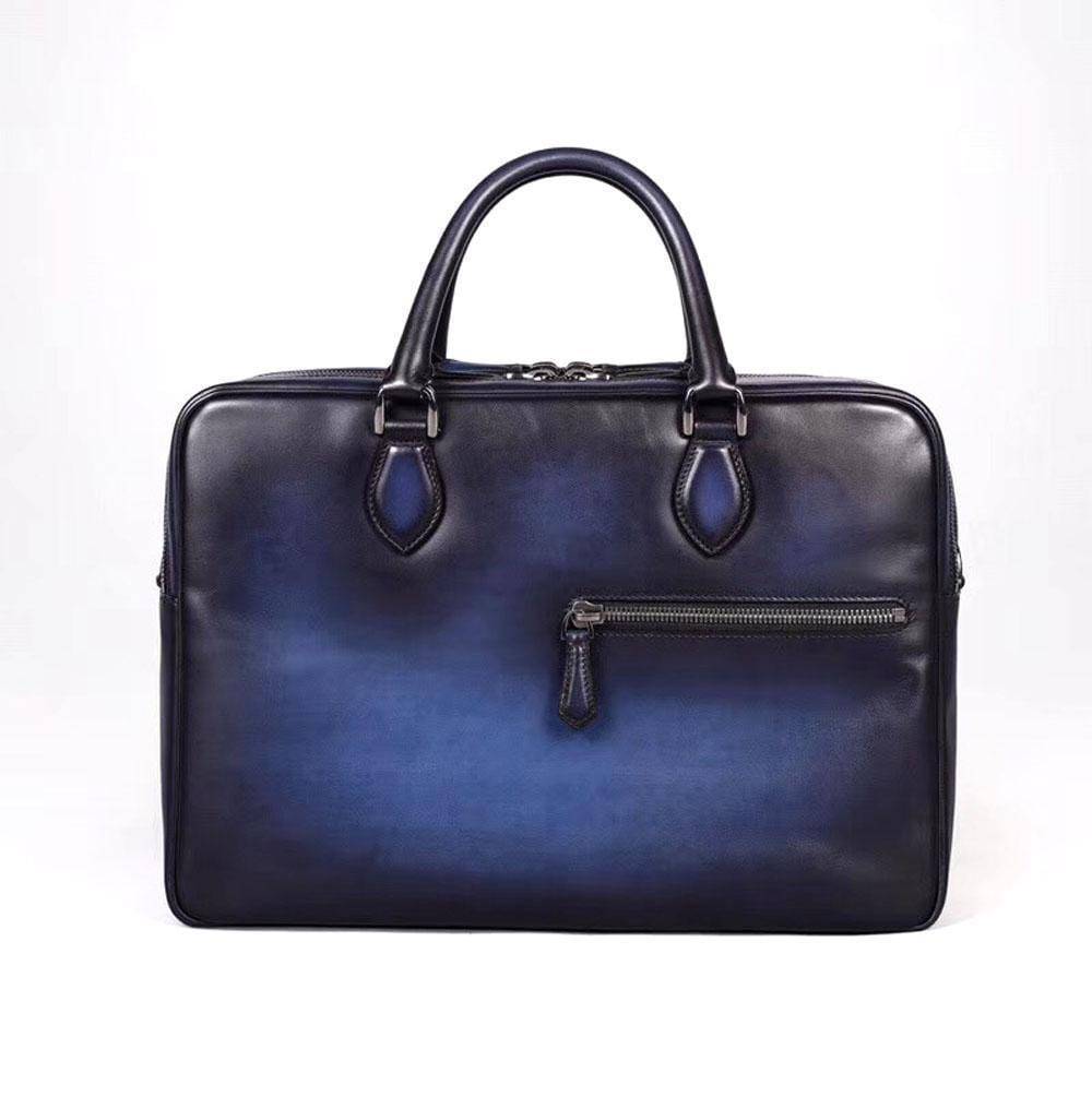 Vintage smooth cowhide leather briefcase by Rossie Viren, featuring a classic business bag and laptop handbag design.