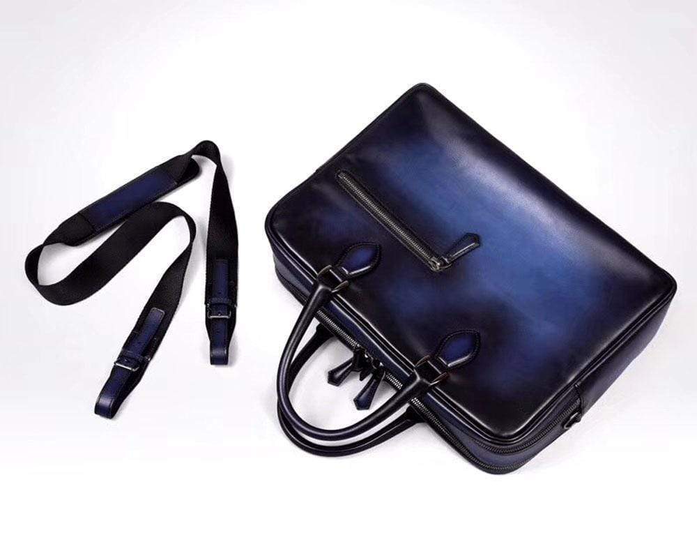Vintage Rossie Viren leather briefcase and laptop handbag in smooth cowhide with sturdy handles and classic design.