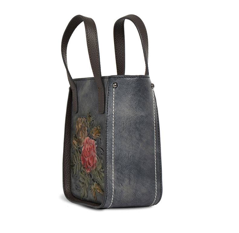 Rossie Viren women's leather mini tote crossbody bag with sleek design and adjustable strap, perfect for everyday use.