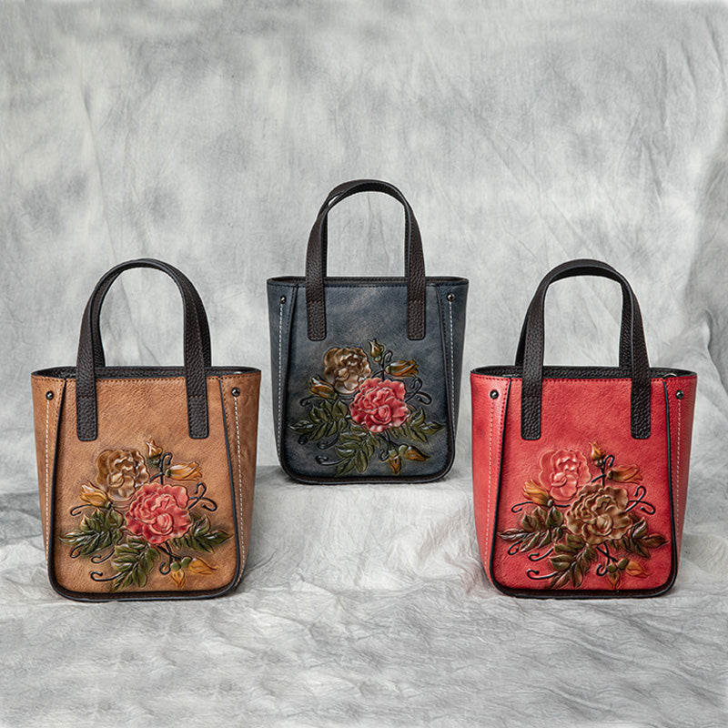 Rossie Viren women's leather mini tote crossbody bag with adjustable strap and top zipper closure.