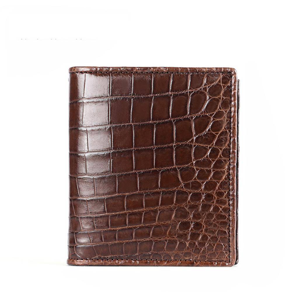 Men's bifold leather wallet by Rossie Viren made from genuine crocodile and belly leather, featuring a sleek, textured surface.
