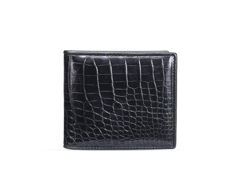 Men's bifold leather wallet by Rossie Viren made from genuine crocodile and belly leather, showcasing a sleek, textured design.