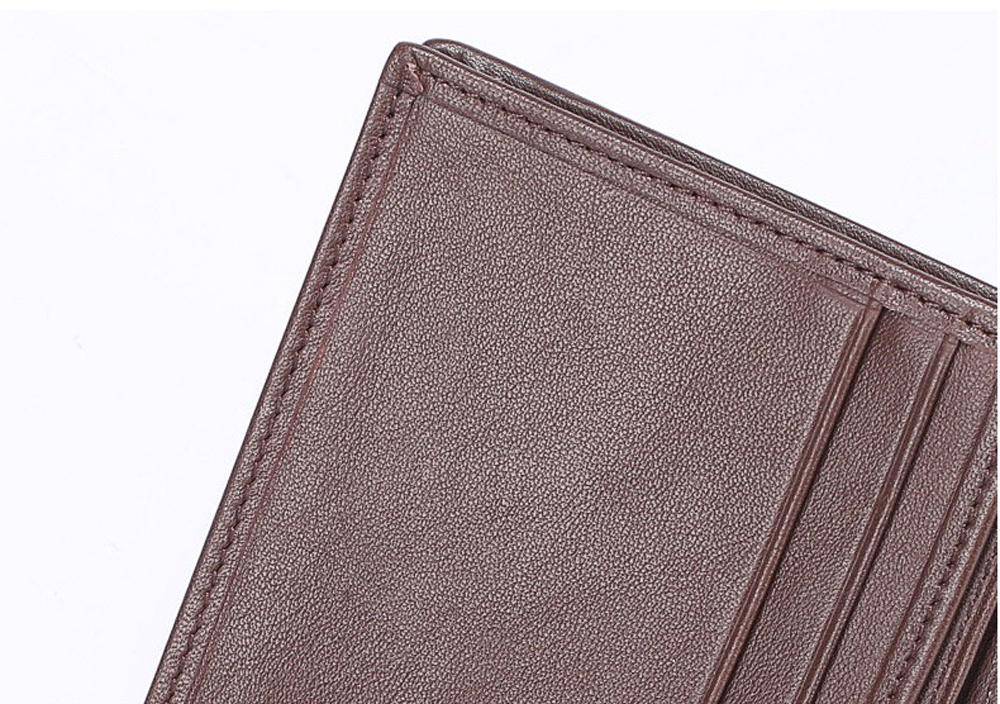 Men's bifold leather wallet by Rossie Viren, made from genuine crocodile and belly leather, showcasing its textured exterior.