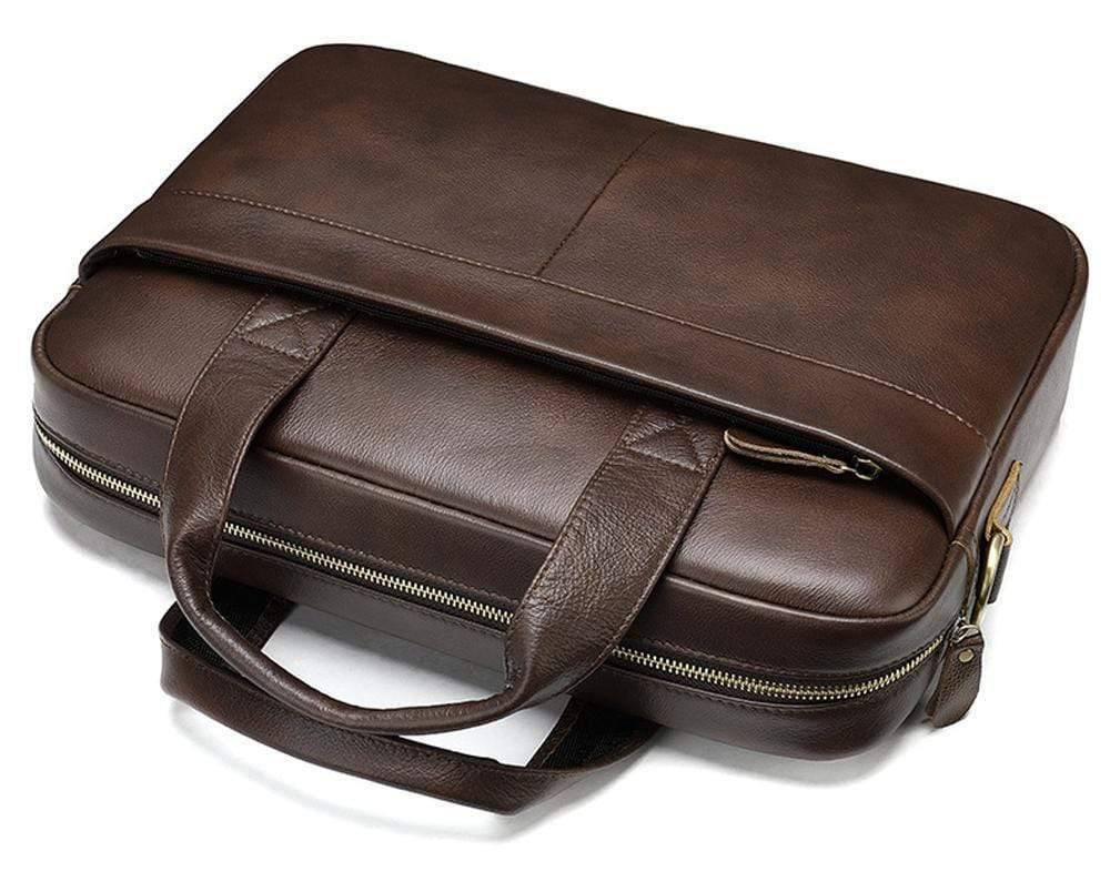 Men's brown leather Attache briefcase bag by Rossie Viren, featuring a sleek design and sturdy handle for professional use.
