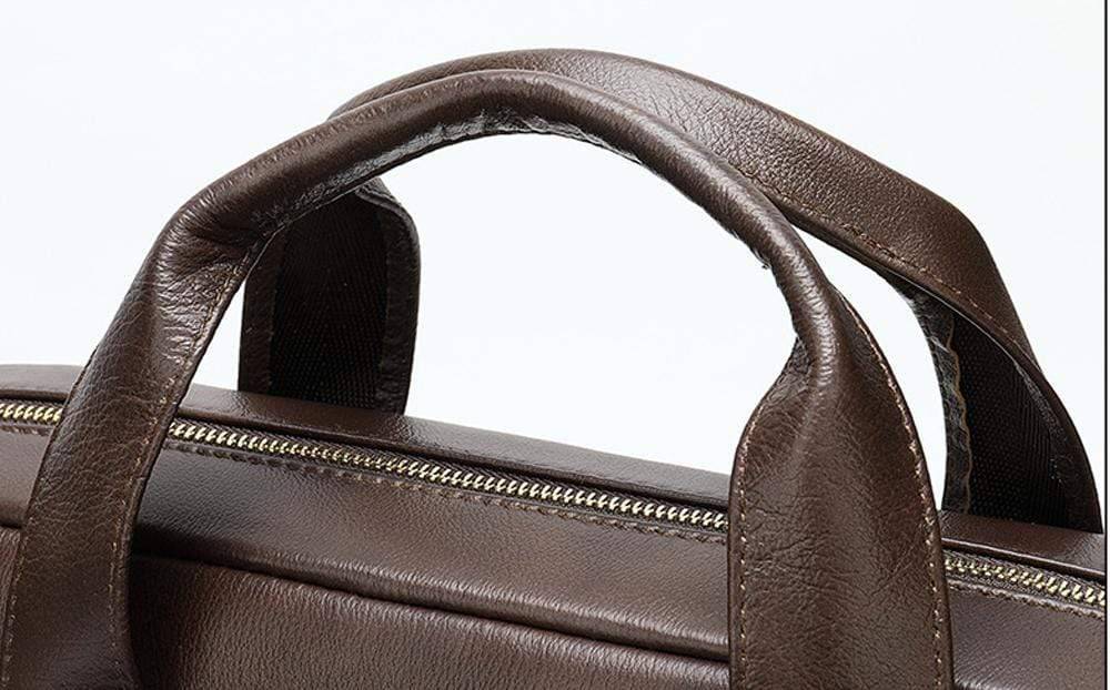 Men's brown leather attache briefcase bag by Rossie Viren, featuring a sleek, professional handbag with sturdy handles and classic design.