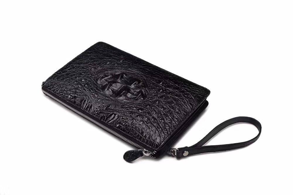 Men's crocodile bone leather zip clutch wallet by Rossie Viren with multiple card slots and a sleek long design.