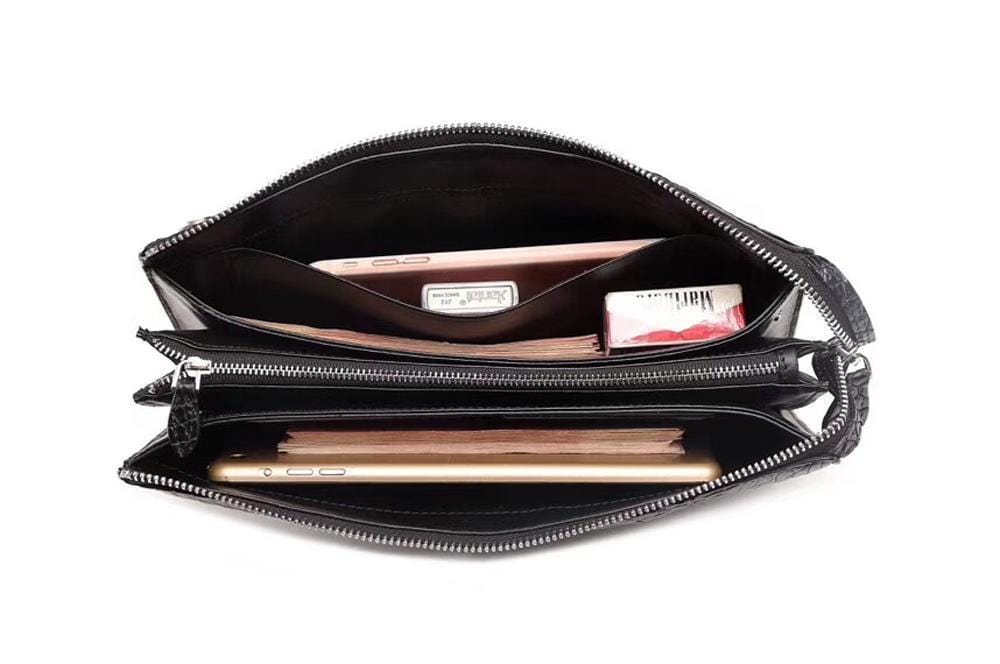 Men's Rossie Viren crocodile bone leather zip clutch wallet with multiple card slots and a sleek long design.