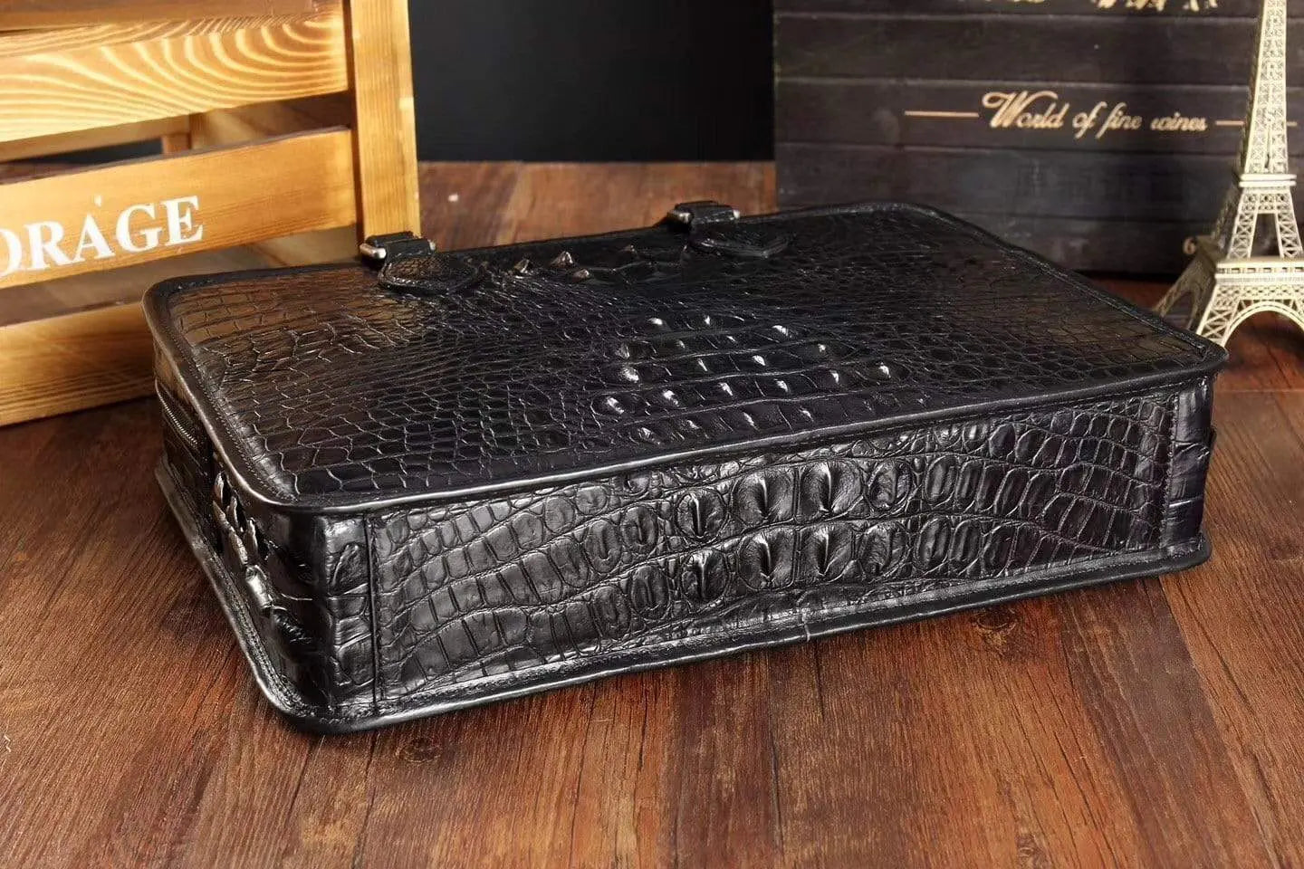 Men's crocodile leather briefcase by Rossie Viren with top handle, stylish and professional handbag for business use.