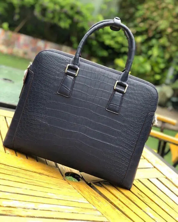 Men's crocodile leather laptop bag briefcase by Rossie Viren, featuring a sleek handbag design with textured crocodile pattern.