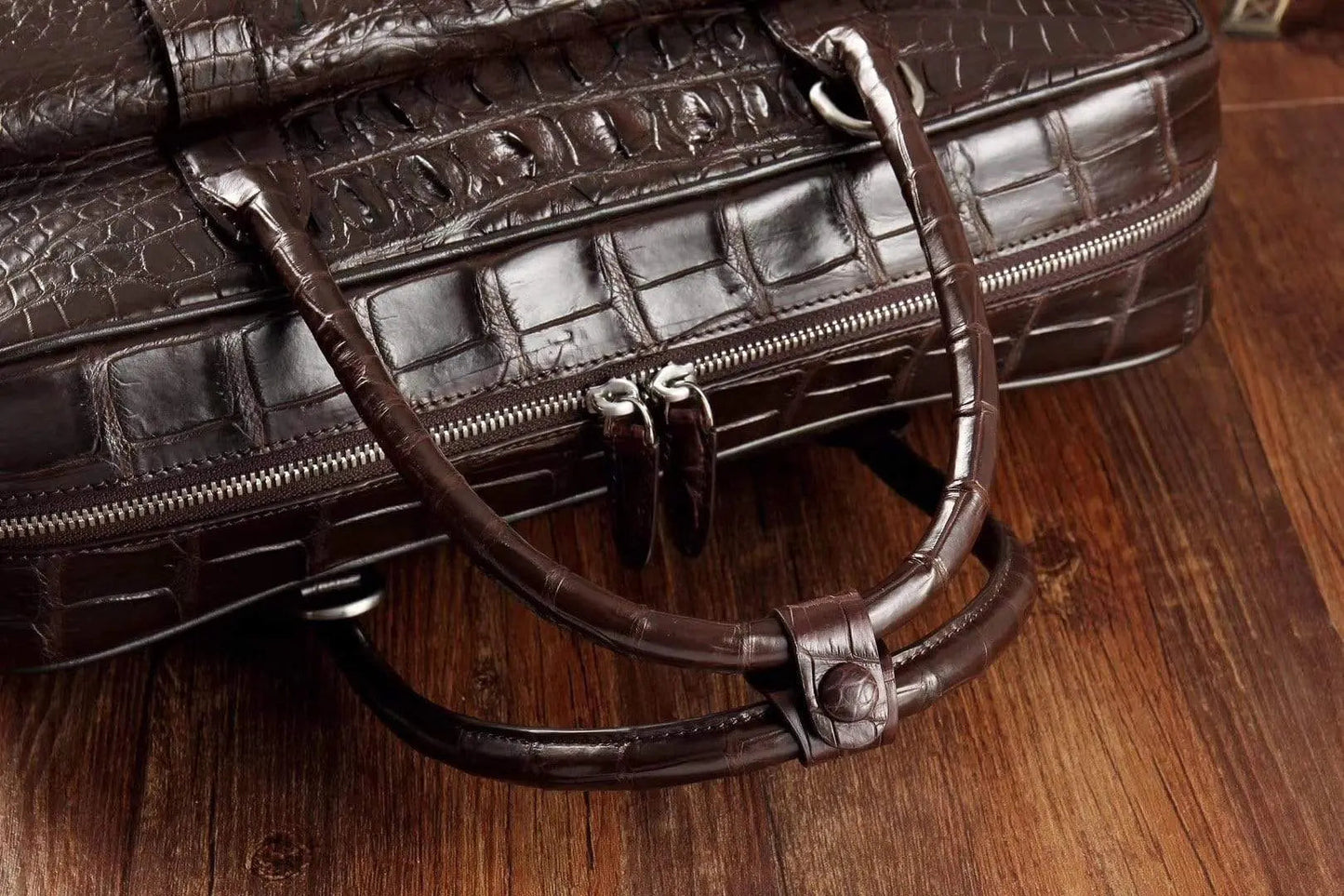 Men's crocodile leather large briefcase and messenger bag with front pocket, designed by Rossie Viren for stylish laptop carrying.