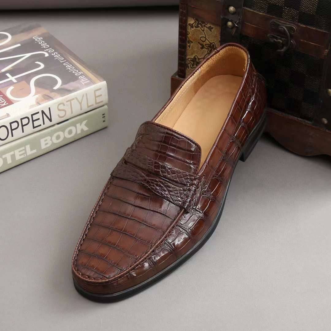 Men's crocodile leather slip-on loafers by Rossie Viren featuring sleek crocodile shoes design and polished finish.