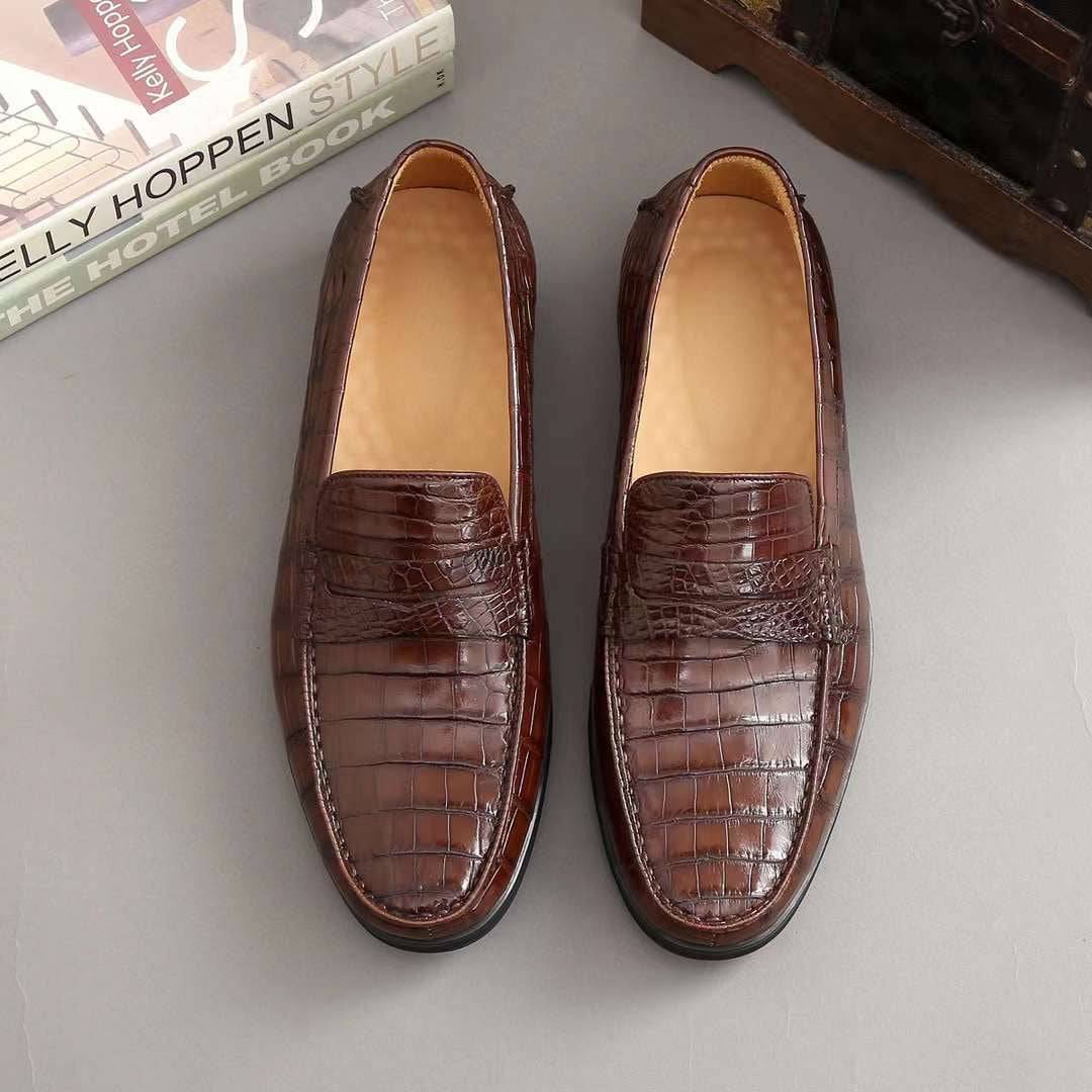 Men's crocodile leather slip-on loafers by Rossie Viren, showcasing sleek crocodile shoes with a polished finish and streamlined design.