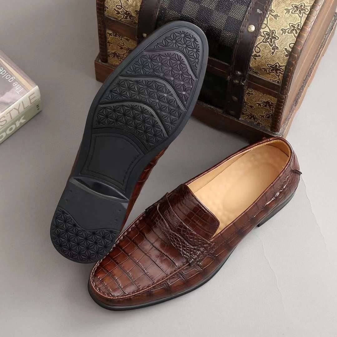 Men's crocodile leather slip-on loafers by Rossie Viren, showcasing sleek crocodile shoes with a polished finish and slip-on design.