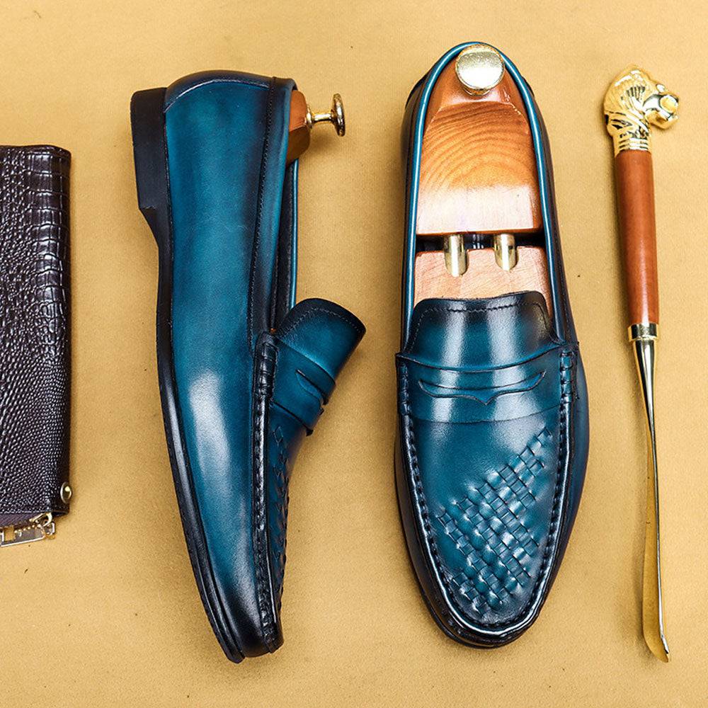 Men's Rossie Viren driving leather shoes and casual loafers, showing a sleek black leather design with comfortable slip-on style.