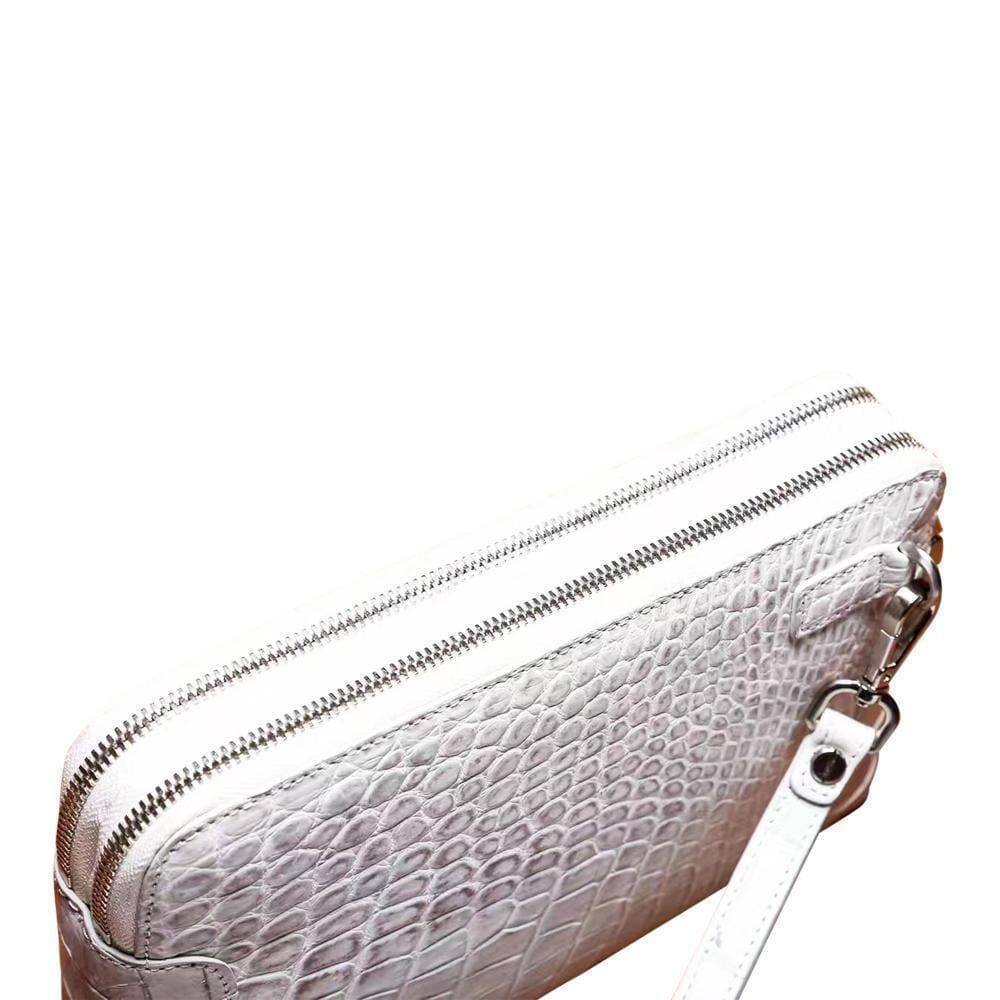 Men's genuine crocodile leather clutch bag by Rossie Viren with double zip closure, featuring a sleek, textured crocodile skin finish.