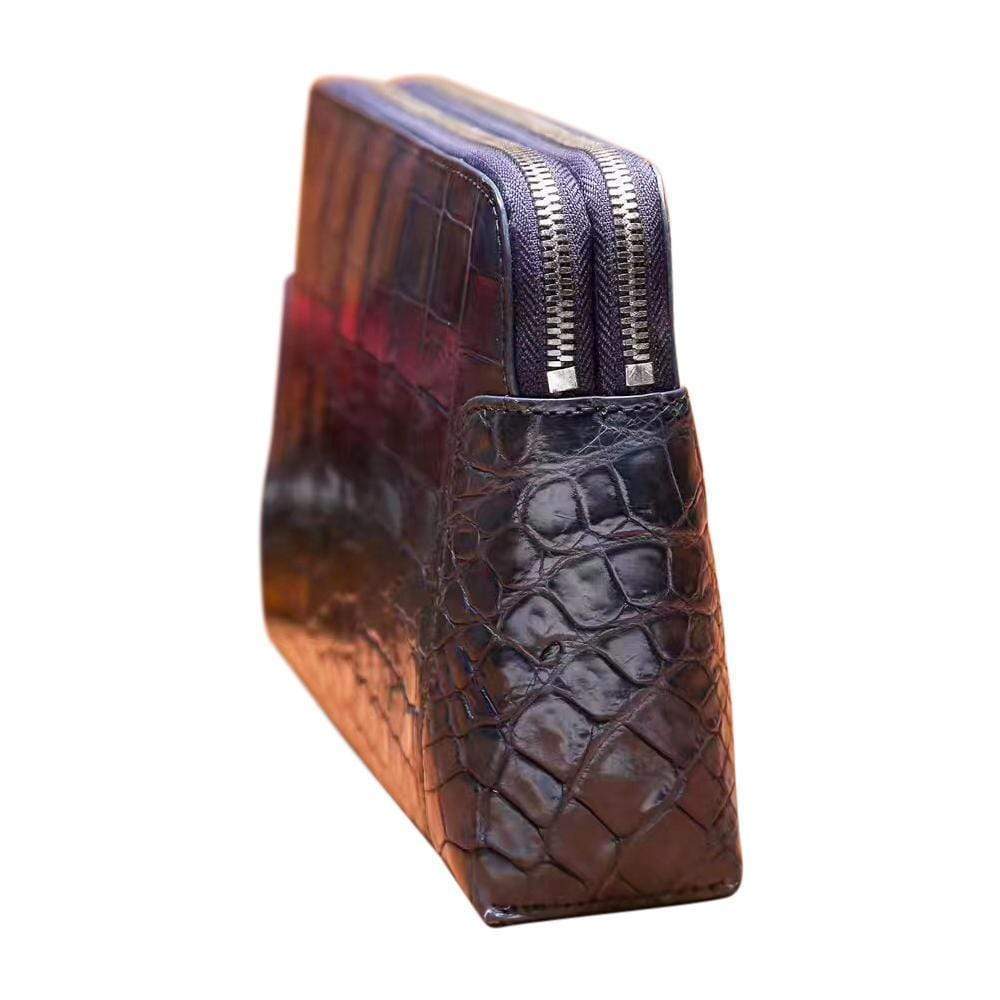 Men's genuine crocodile leather clutch bag by Rossie Viren with double zip closure and sleek design.