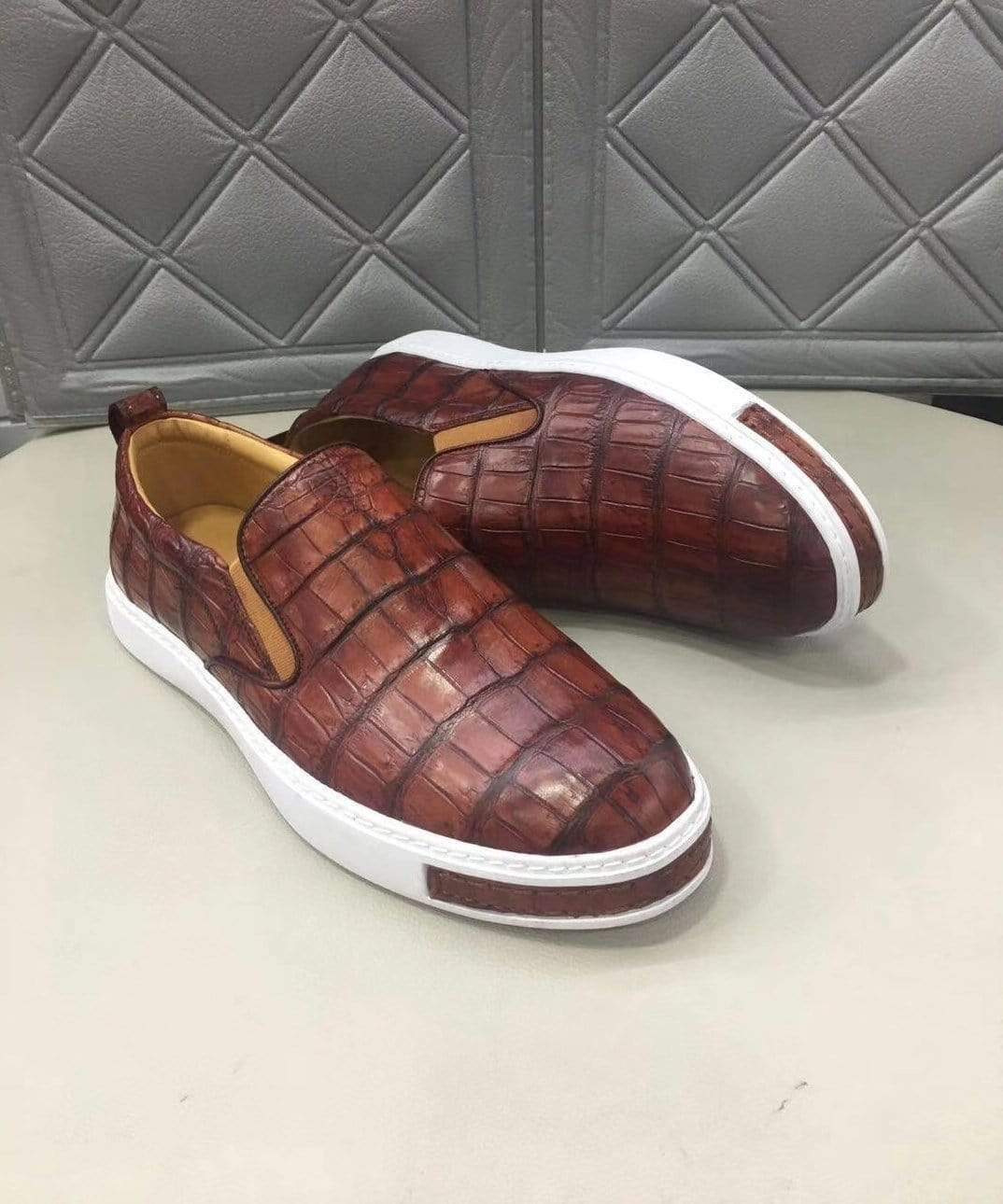 Men's brown crocodile leather driving shoes by Rossie Viren with slip-on flats for comfortable walking and casual wear.