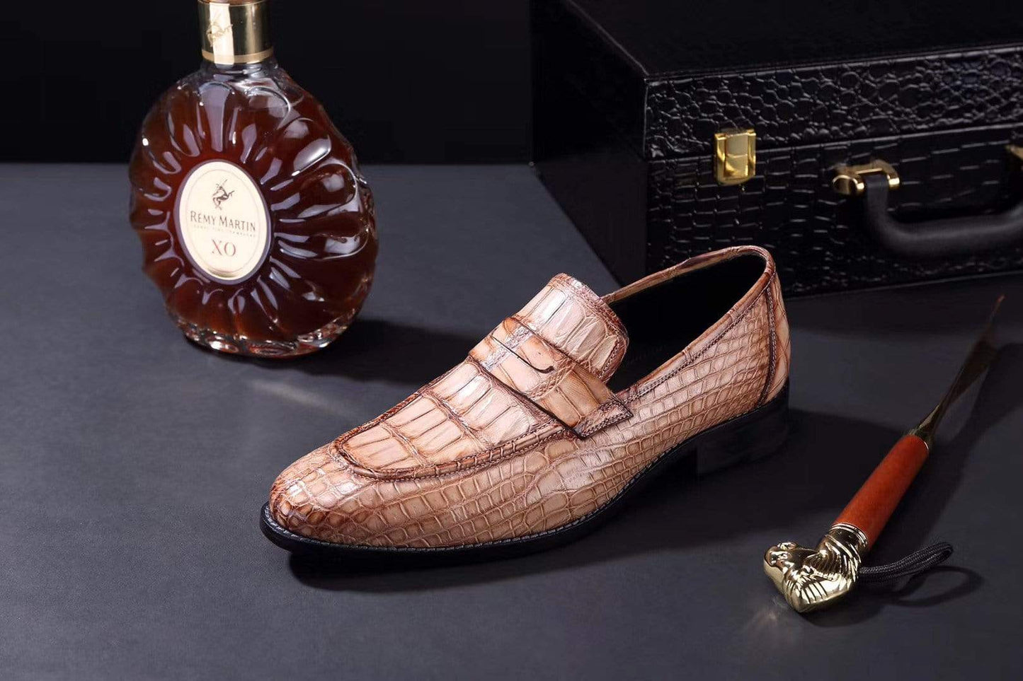 Men's crocodile leather penny loafer shoes by Rossie Viren, showcasing polished crocodile pattern and classic slip-on design.