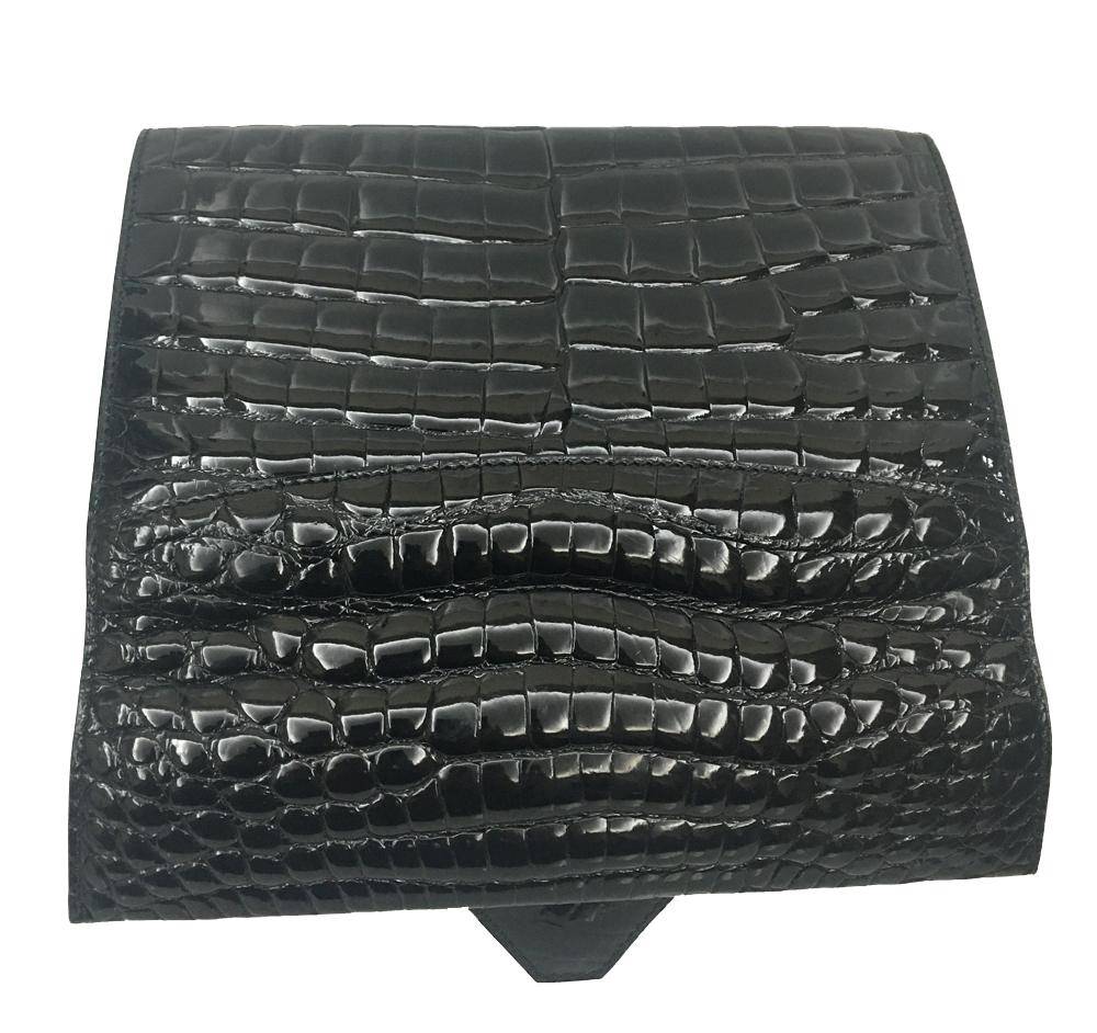 Mens black crocodile leather clutch bag with high gloss finish and beaded detailing, stylishly designed by Rossie Viren.