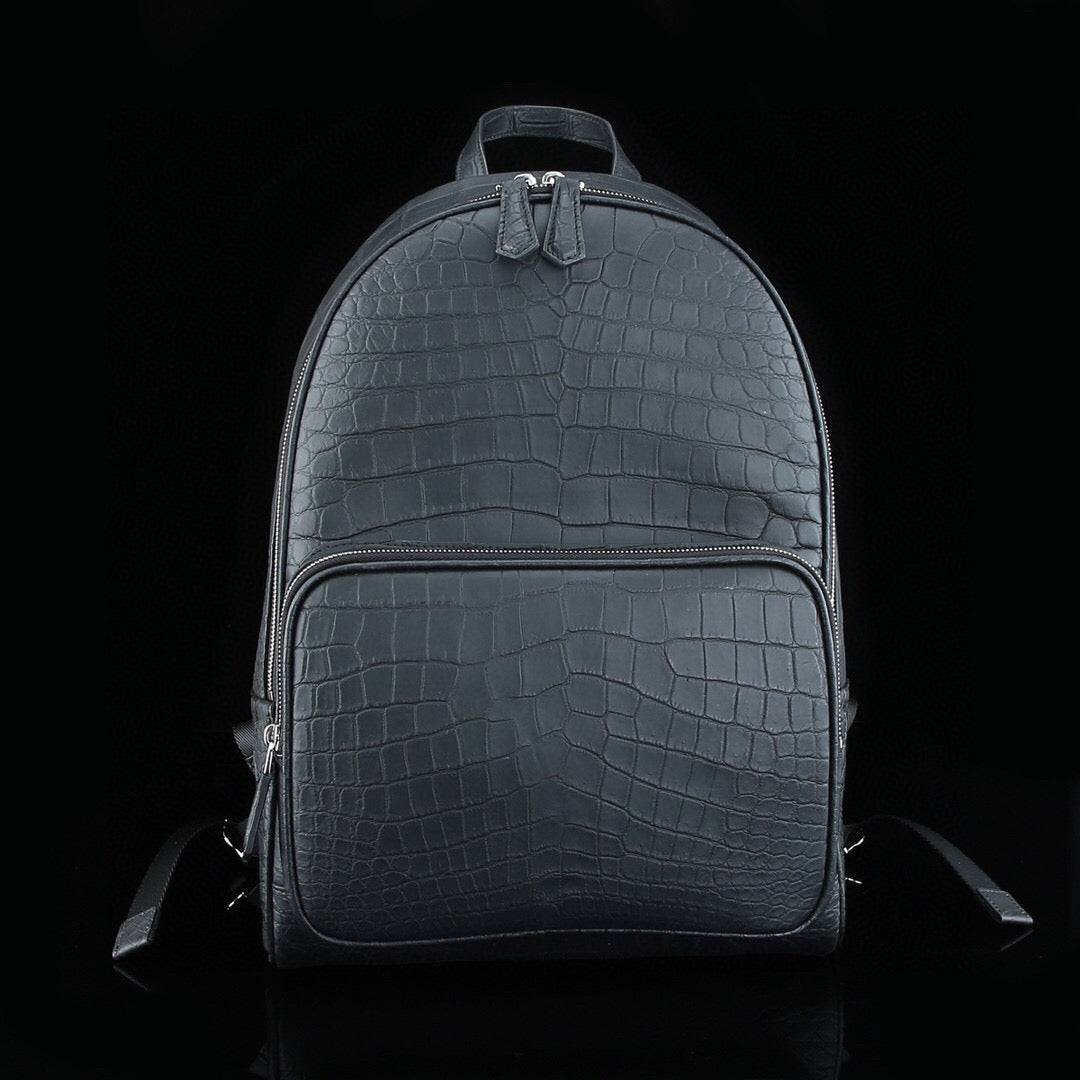 Large black crocodile leather backpack by Rossie Viren, featuring a matte finish and spacious design for men.